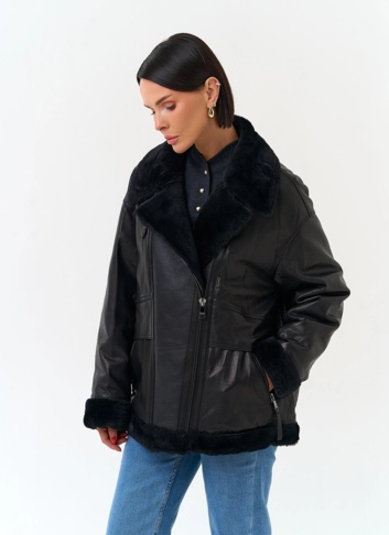 Женский пуховик из натуральной кожи фото